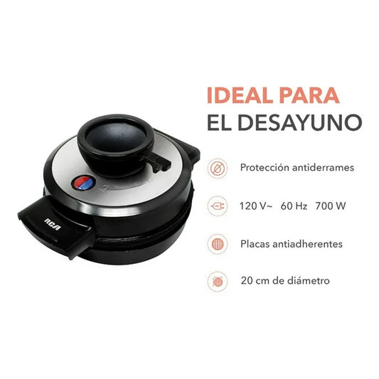 Waflera negra y plateada con placa antiadherente y botón indicador, diseño compacto y redondo.