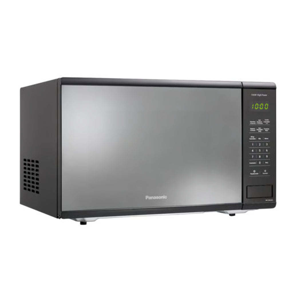 Horno microondas Panasonic 1.3 pies negro con puerta reflectante y panel táctil digital a la derecha.