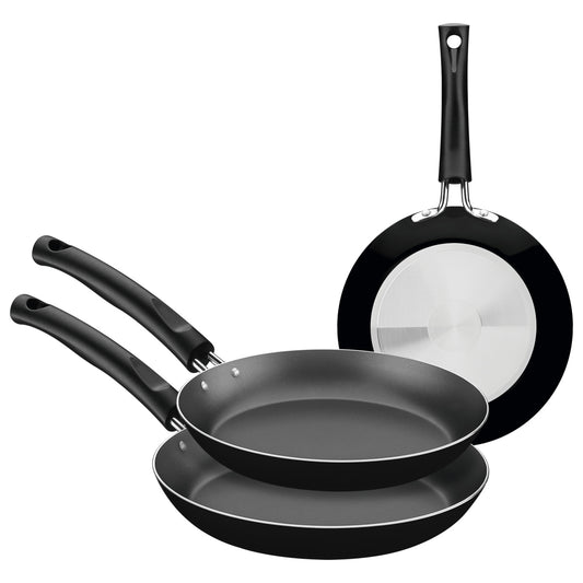 Juego de sartenes Tramontina negros antiadherentes con base de acero inoxidable y mango ergonómico.