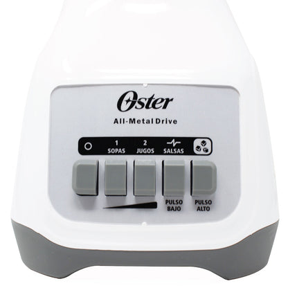 Base blanca de licuadora Oster con botones gris claro para sopas, jugos y salsas, dos velocidades.