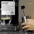 Cafetera profesional RCA negra con espumador de leche y panel digital moderno.