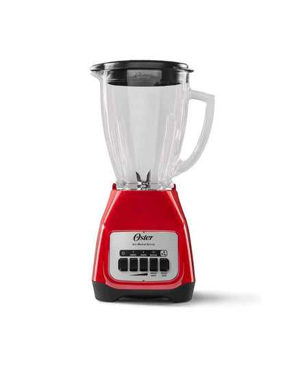 Licuadora Oster Kaliman roja con vaso de vidrio transparente y base con panel de dos velocidades.