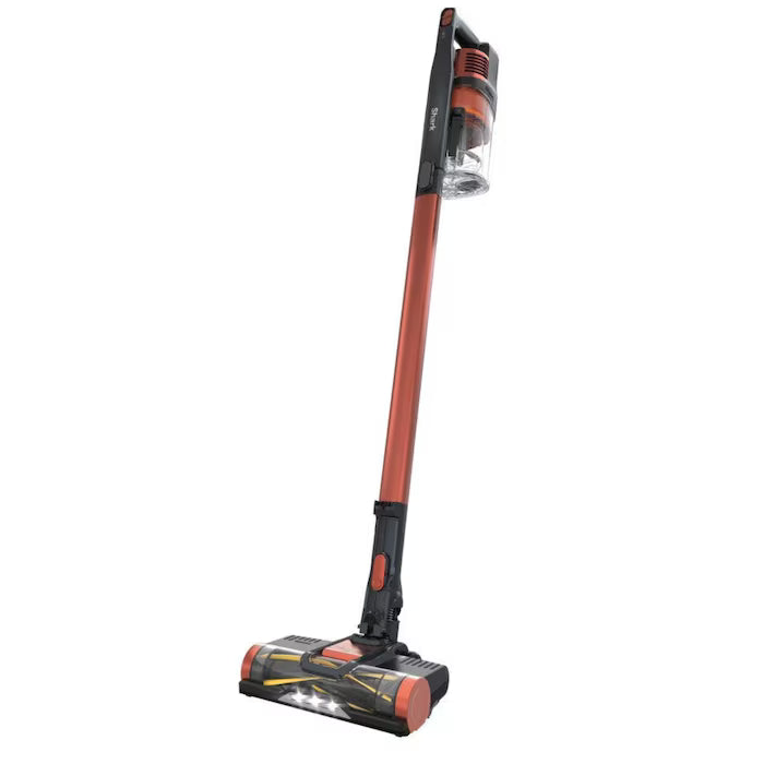 Aspiradora vertical Shark Pet Pro inalámbrica naranja oscuro con diseño delgado y base giratoria.