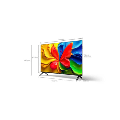 Pantalla TCL 32" QLED 2K con marco plateado y soporte en V, colores vivos en pantalla.