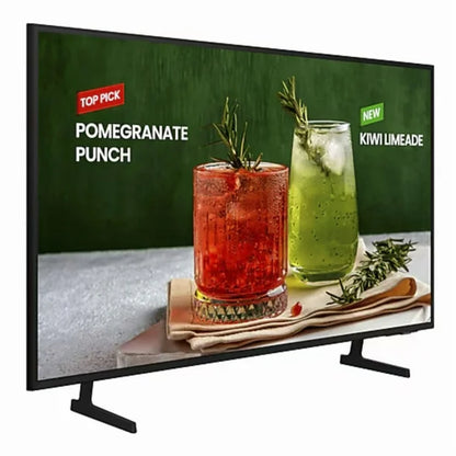 Pantalla Samsung Smart TV 55" con base en V negra y imagen de cócteles en pantalla.