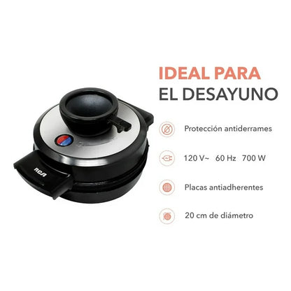 Waflera negra y plateada con placa antiadherente y botón indicador, diseño compacto y redondo.
