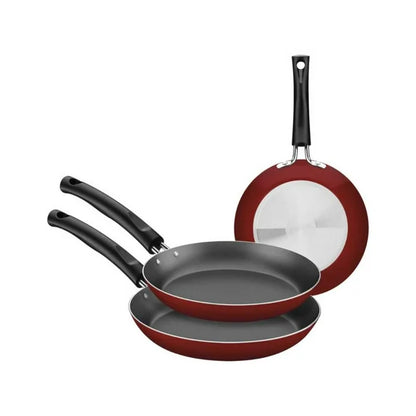 Set de tres sartenes Tramontina Chelsea rojo con interior antiadherente y mango ergonómico negro.