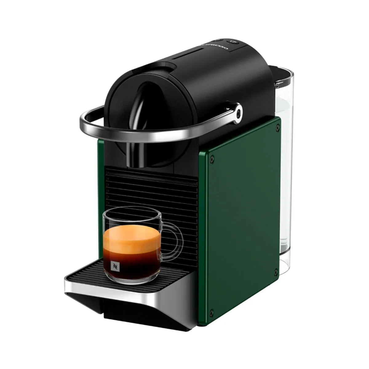 Cafetera Nespresso Pixie compacta verde con soporte metálico y vaso de espresso con crema visible.