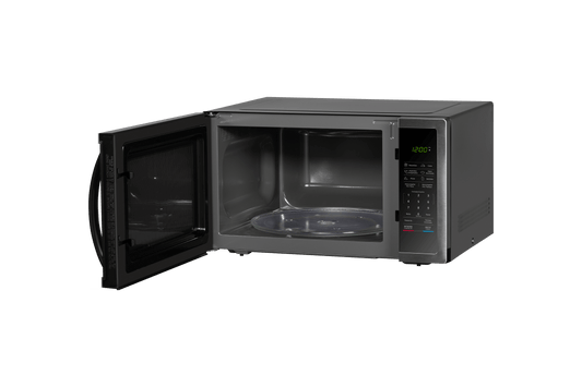 Horno microondas Midea acero inoxidable 1.6 pies con puerta espejo y panel digital abierto.