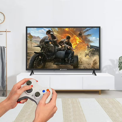 Televisor Sansui 32" HD con imagen de videojuego y manos sosteniendo control gris y blanco.