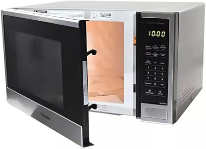 Horno microondas Panasonic 1.3 pies 1100W acero inoxidable con puerta abierta y panel digital negro.