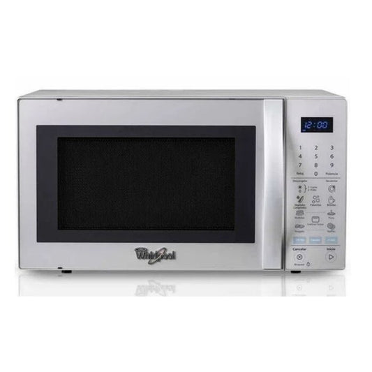 Horno microondas Whirlpool plateado con puerta de vidrio y panel digital táctil azul y blanco.