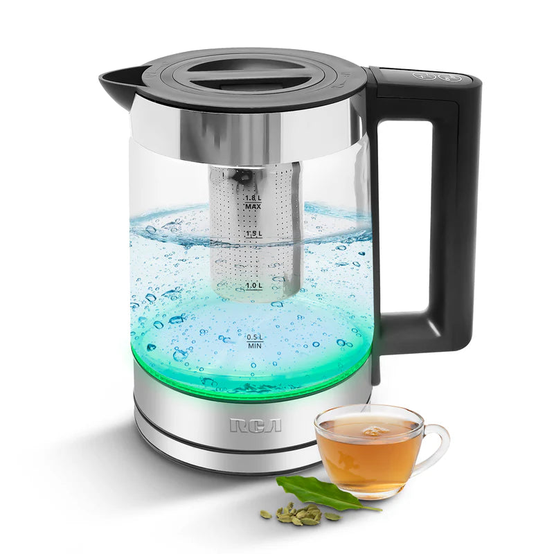 Tetera digital RCA de vidrio transparente con infusor metálico y base iluminada en verde.